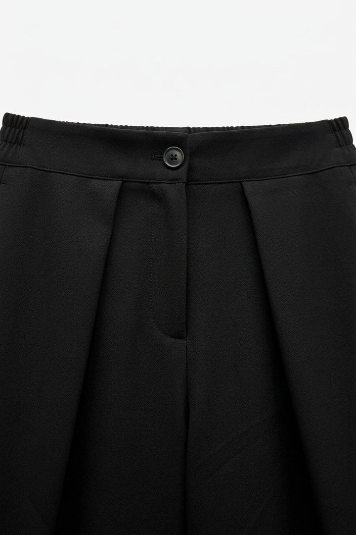 PANTALON LARGE À PLIS