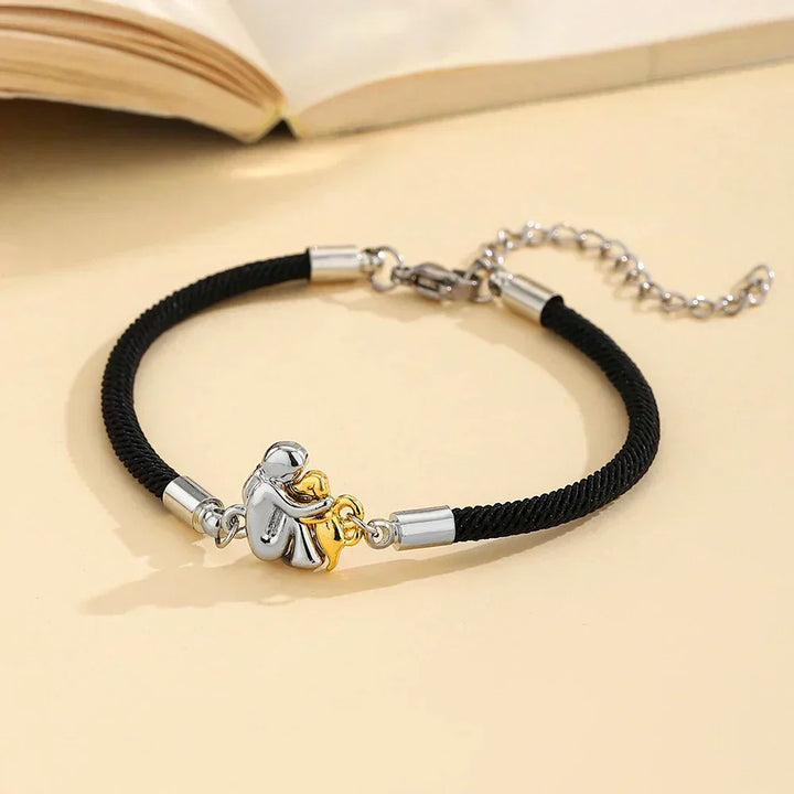 Katy™ – Bracelet à cordon avec icône de chien